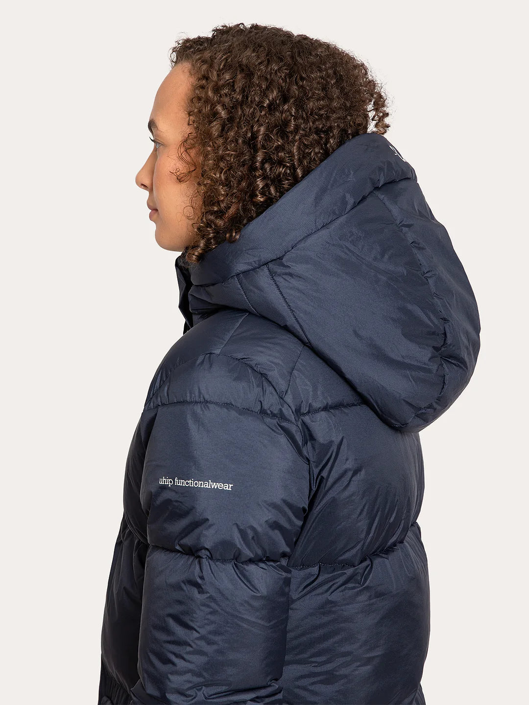 Uhip Arctic Puffer Coat in Eclipse colour - women's long insulated winter coat side hoodtview for horse riding, dog walking and outdoor winter wear.