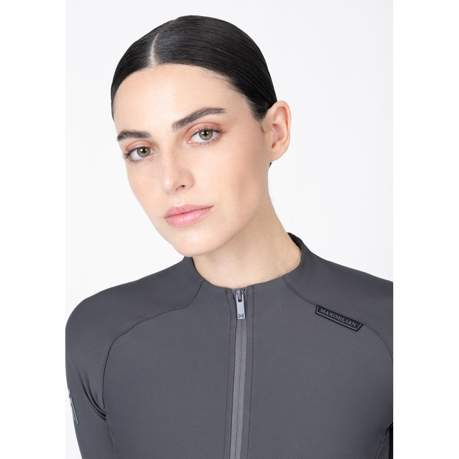 Close-up of women’s grey equestrian base layer with front zipper and logo detail