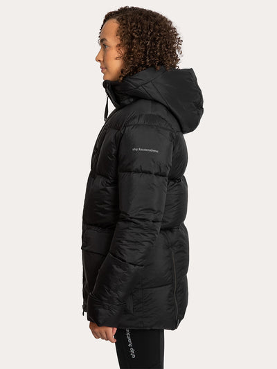 A model shown in profile wearing a Uhip Arctic Puffer Jacket Jet Black against a light grey studio background.