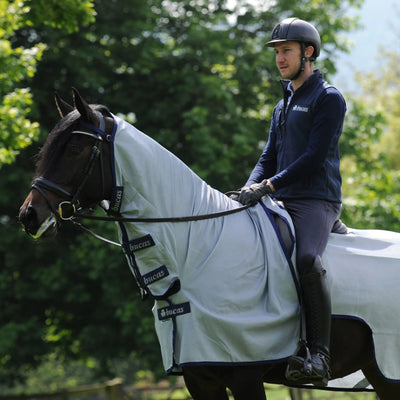 Bucas Buzz-Off Zebra Riding Rug showing breathable mesh design and cut-away saddle area