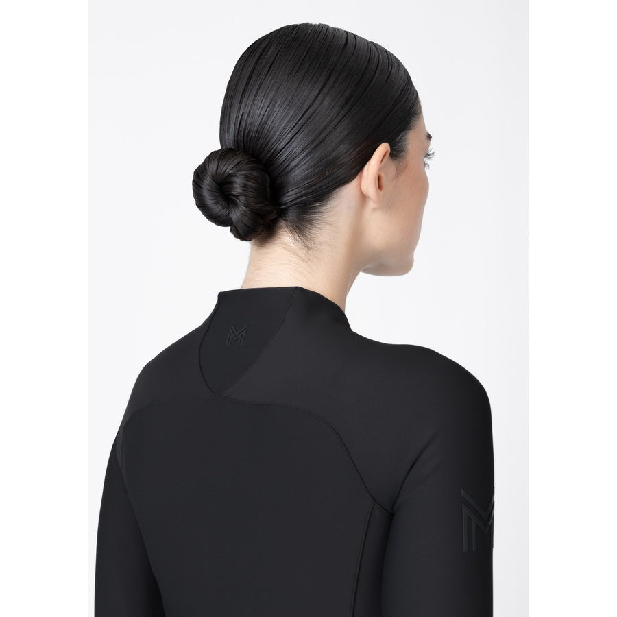 Close-up of black Origin Base Layer showing breathable fabric, half zip closure and premium finish.